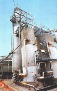 DMSO (Dimethyl Sulfoxide) A large industrial building with many tanks and pipes.